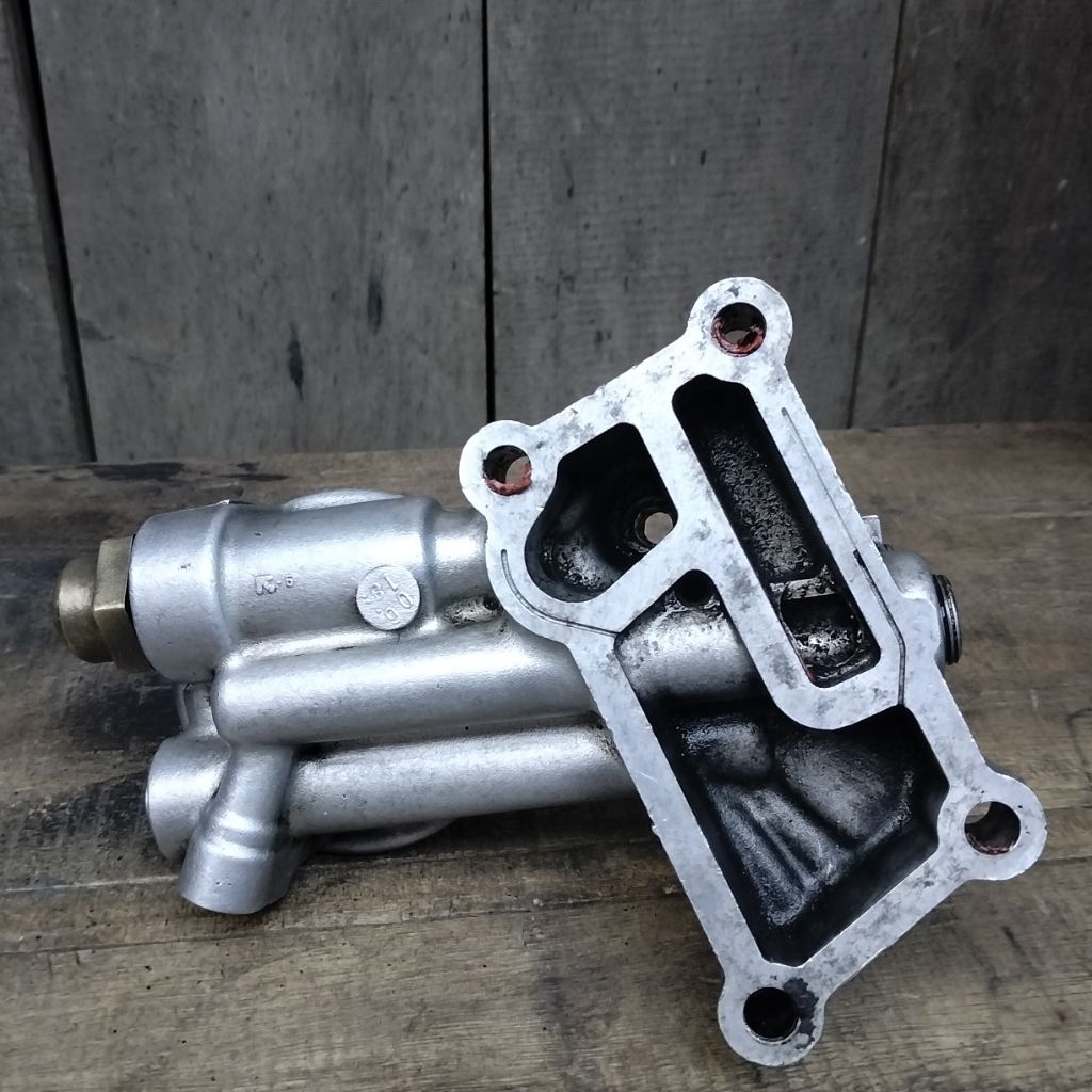 bracket filter oli  dudukan filter oli mesin Mitsubishi L300 /Mitsubishi kuda