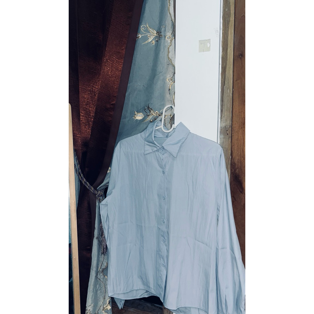 kemeja biru langit