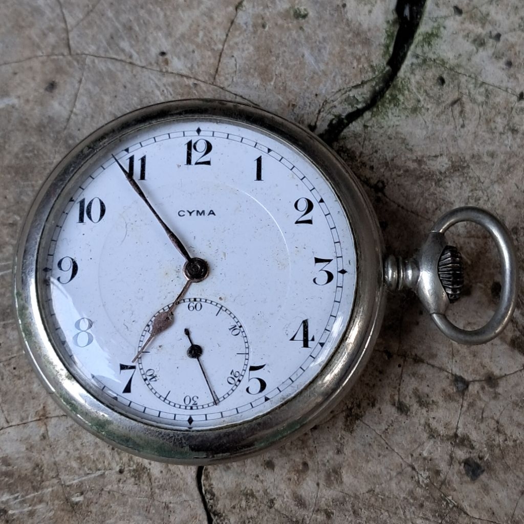 Jam kantong putar tahun 1920-30 an Cyma Swiss Mati