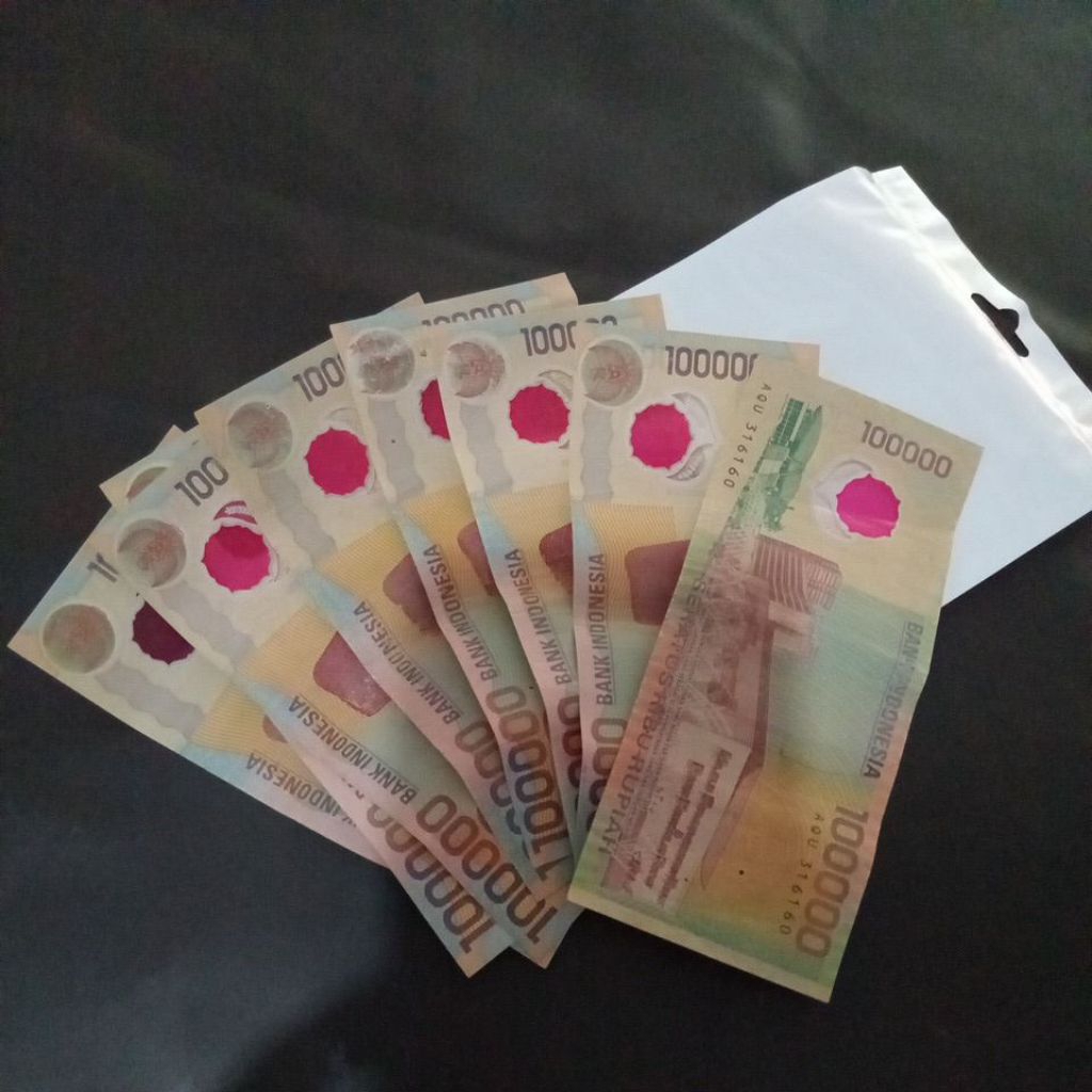 Souvenir uang 100 ribu polymer