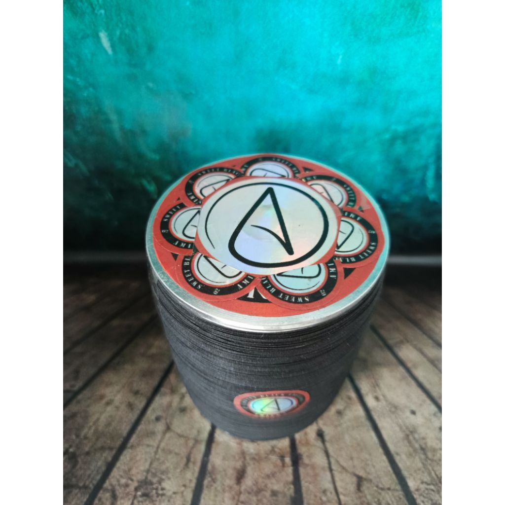 Gelasan Matot Amiera Hattori Hitam Manis Logo Bunga Klos 6000 Yard