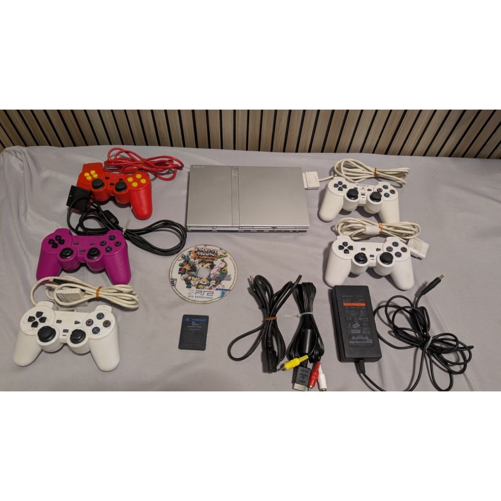 PS2 Slim Warna Silver Optik masih pake kaset Seri SCPH-70004 PAL