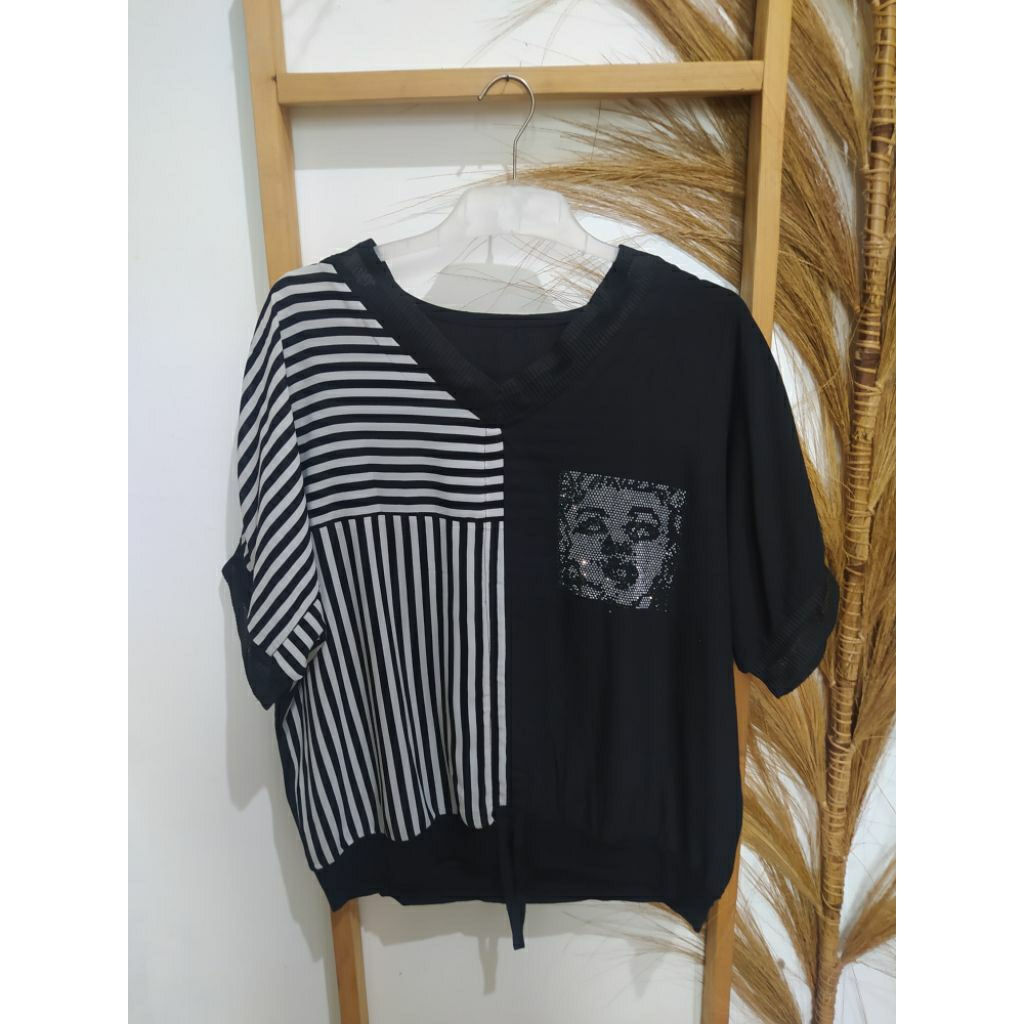 Blouse wanita jumbo lengan pendek