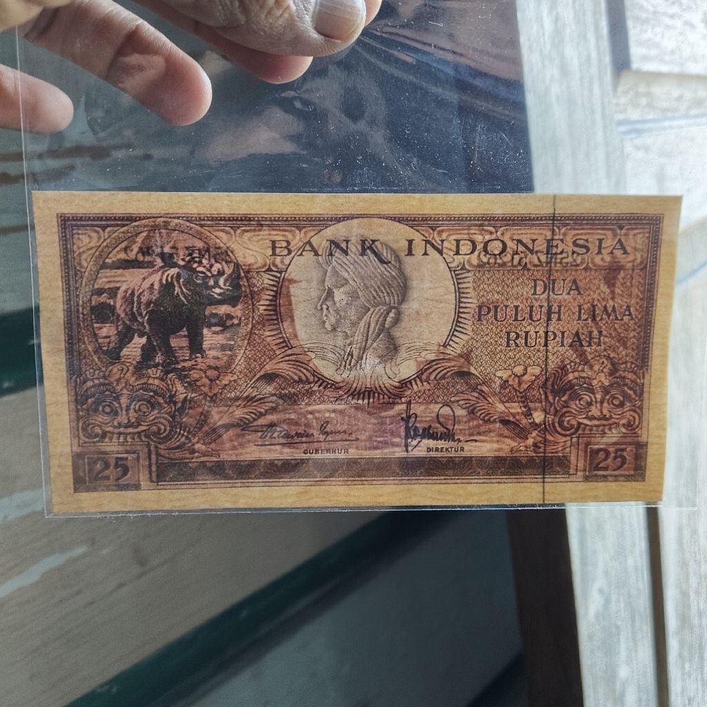 25 rupiah badak seri binatang 1957 (uang repro)