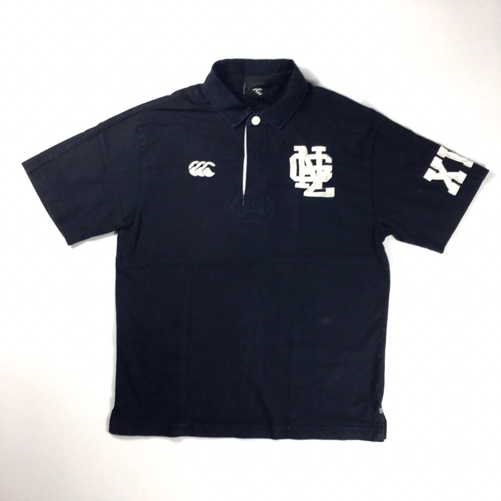 Kaos kerah lengan pendek canterbury bordir