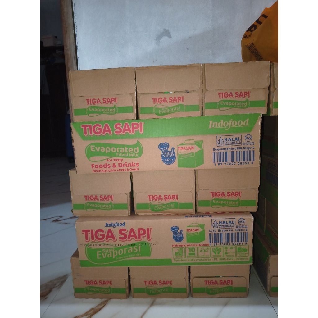 Susu Evaporasi Tiga Sapi Setengah Karton Isi 6