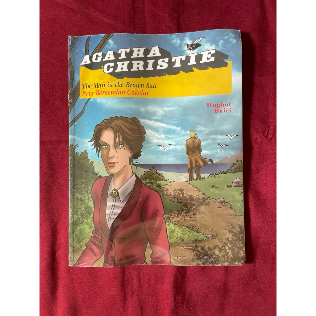 Komik (graphic novel) berjudul "The Man in the Brown Suit / Pria Bersetelan Cokelat By Agatha Christ