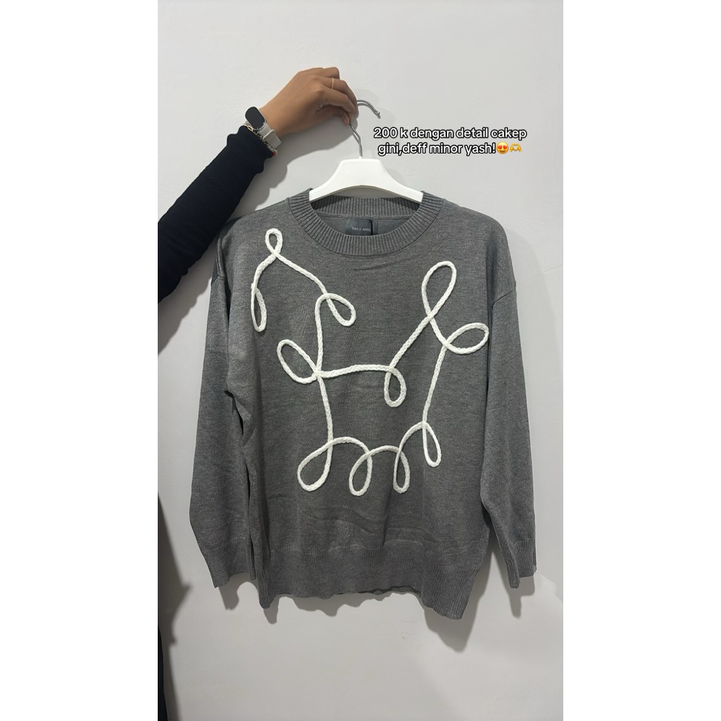 sweater this is april abu