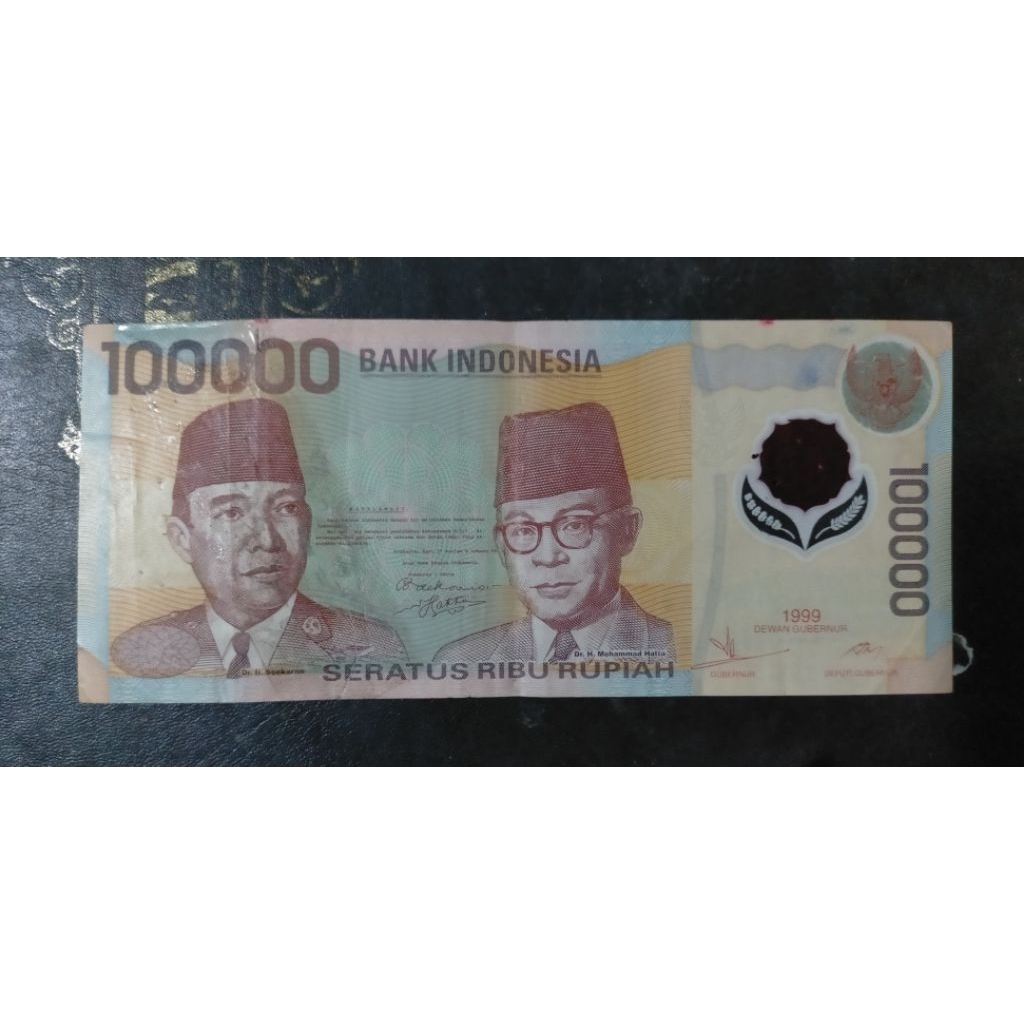 Uang 100000 Sukarno polymer 1999  jelek