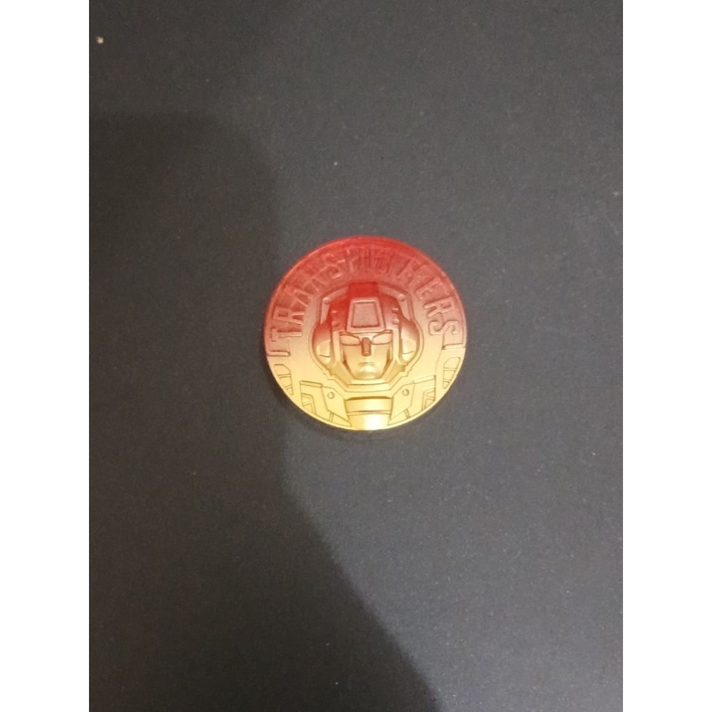 transformer defender jetfire coin