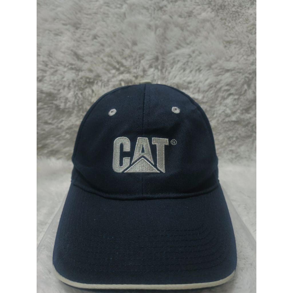 Topi CAT Caterpillar strap Original Second biru navy pekat, bordir rapi dan padat. Cocok buat meleng