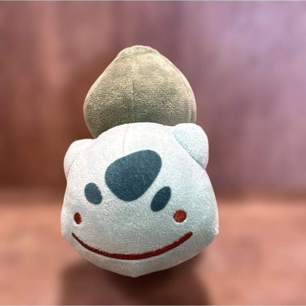 Boneka Plush Ditto sebagai Bulbasaur dari Pokemon Center