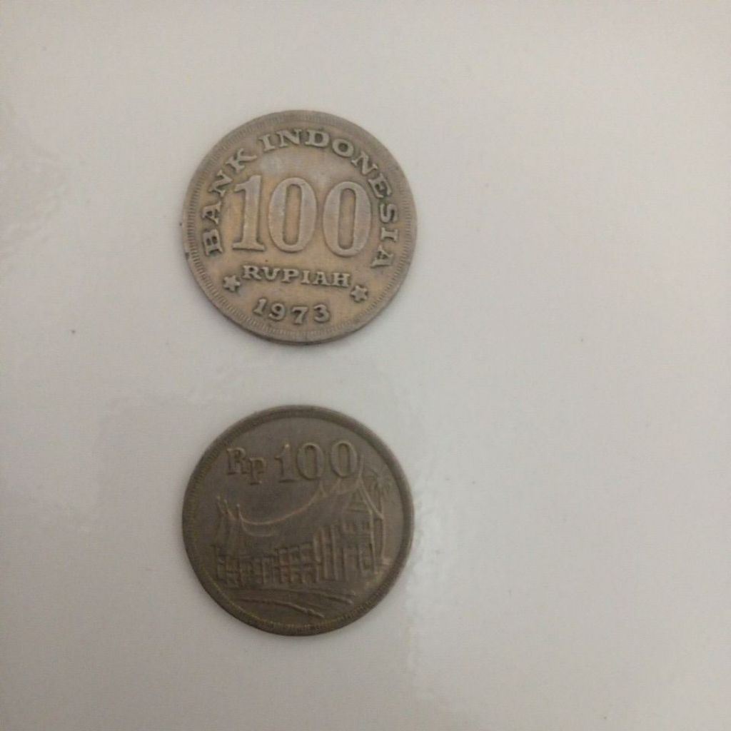 uang koin 100 rupiah lama / kuno