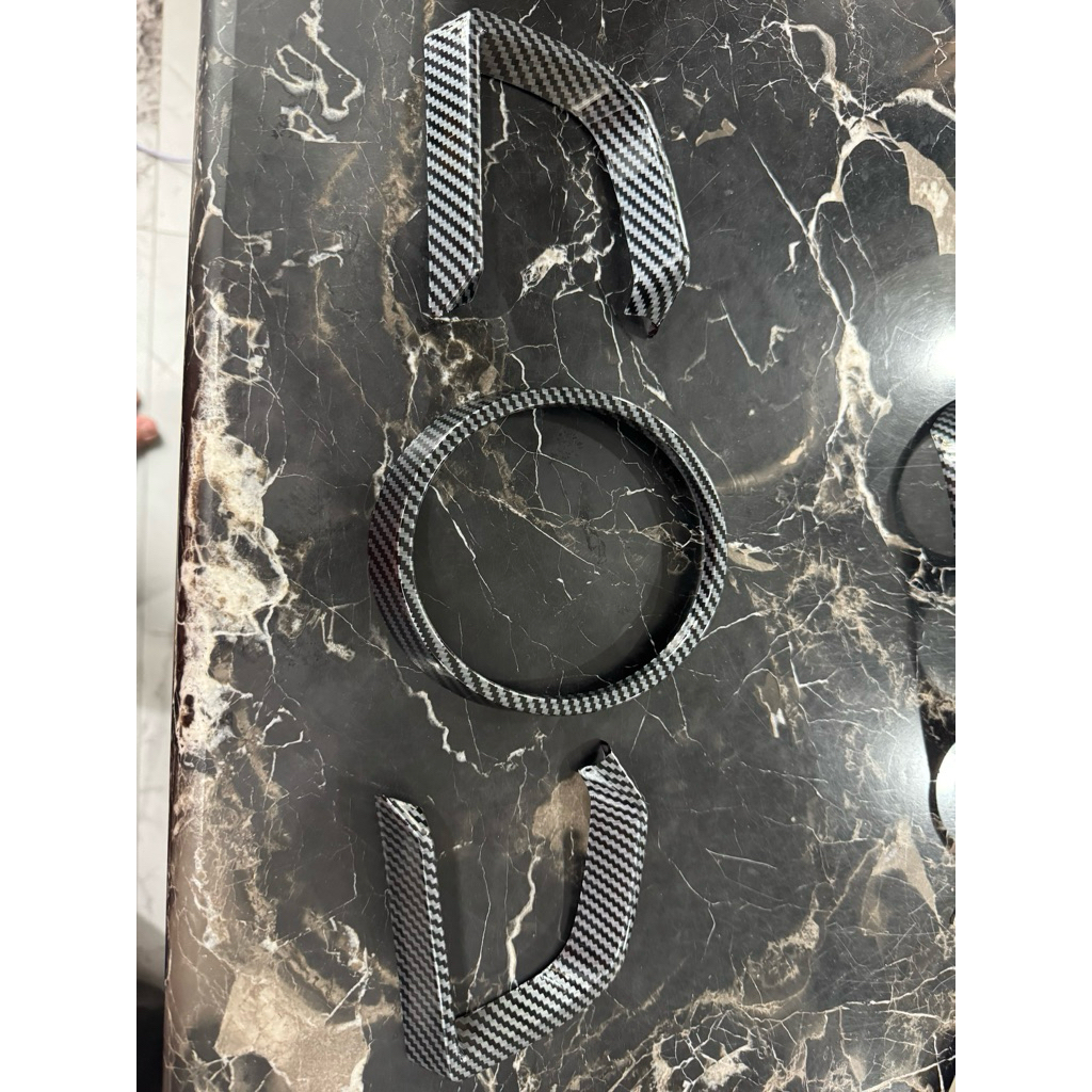 panel carbon mazda 2