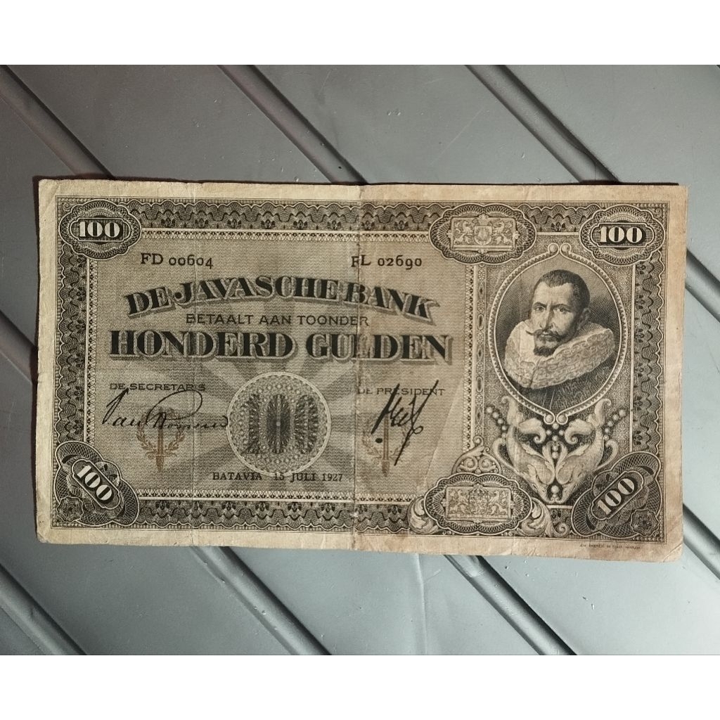 100 gulden coen  sinering kertas masih bagus original asli