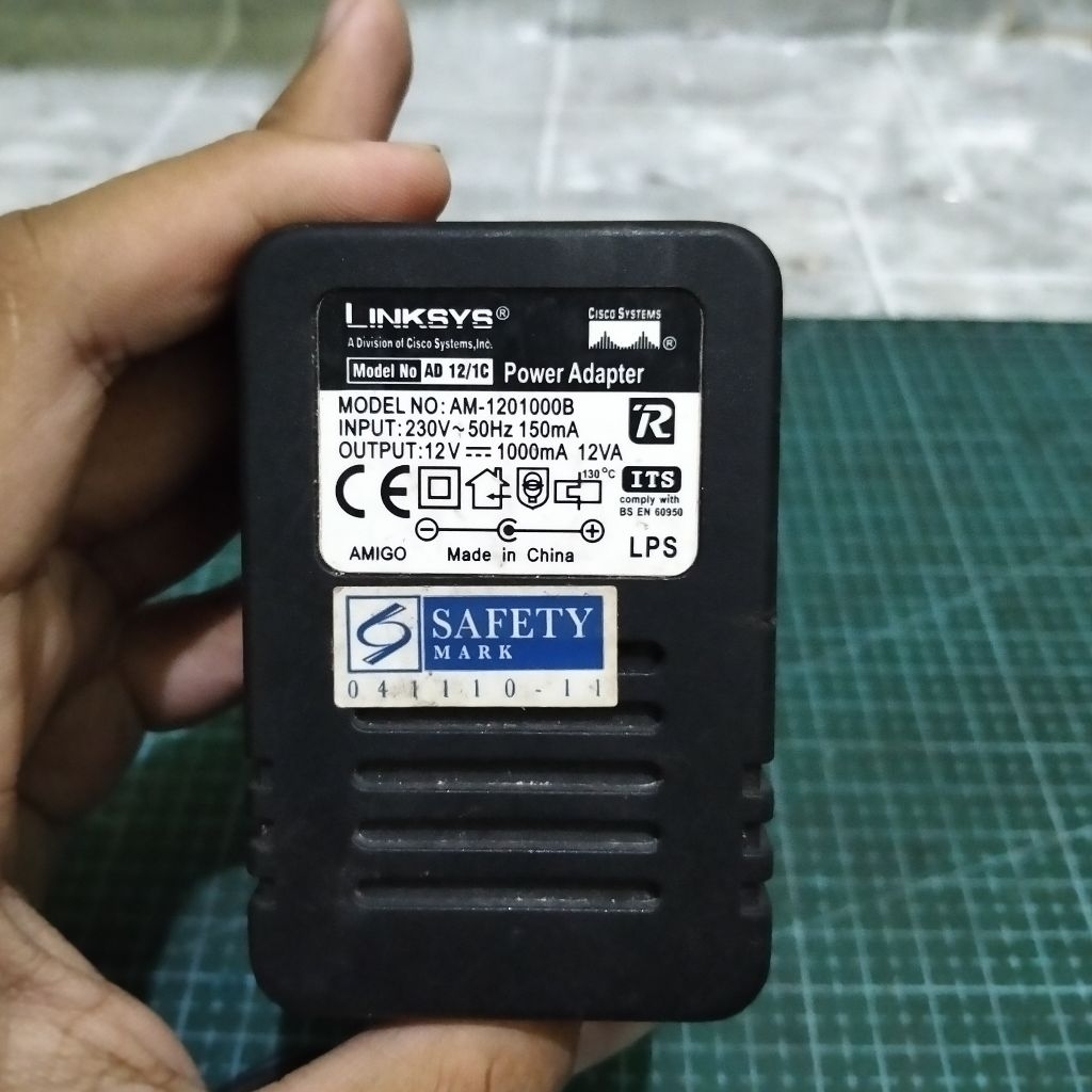 Adaptor Trafo original merek Linksys (Cisco) Terjangkau Mantap