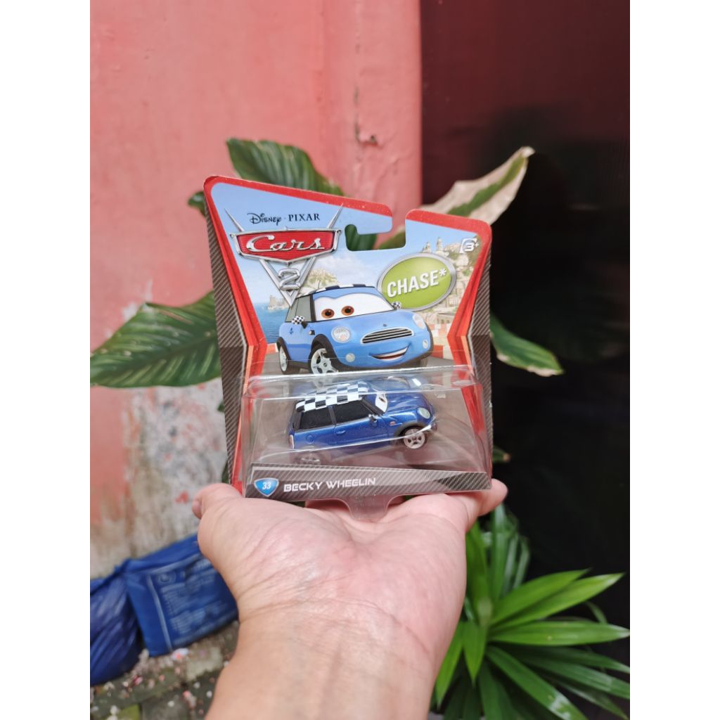 Diecast Mattel 1:55 Becky Wheelin Disney Pixar Cars 2 Chase Car Mini Cooper