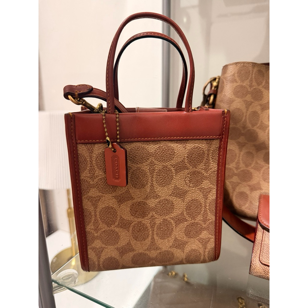 preloved coc tan rust Sling bag