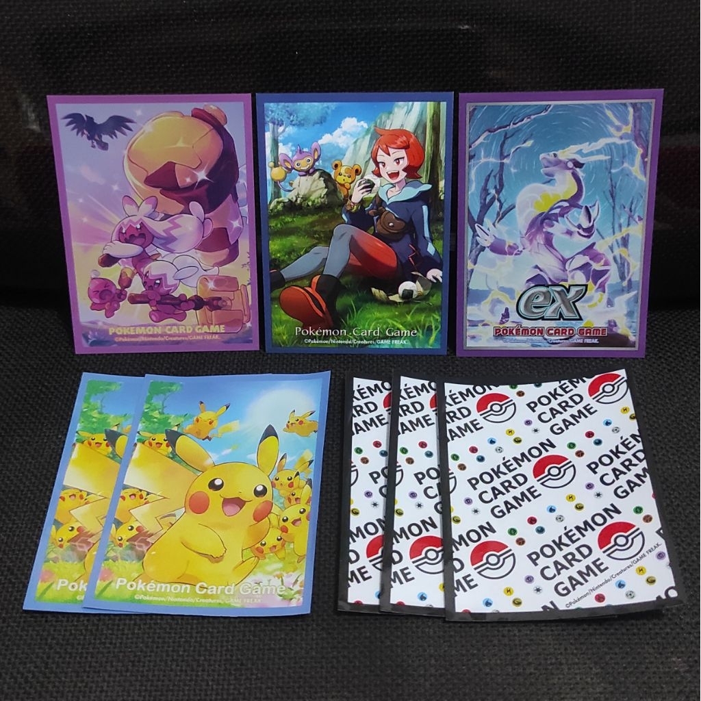 Set 8 Pcs Sleeve Plastik Cover Kartu TCG Pokemon Original Kondisi Second Masih Bagus