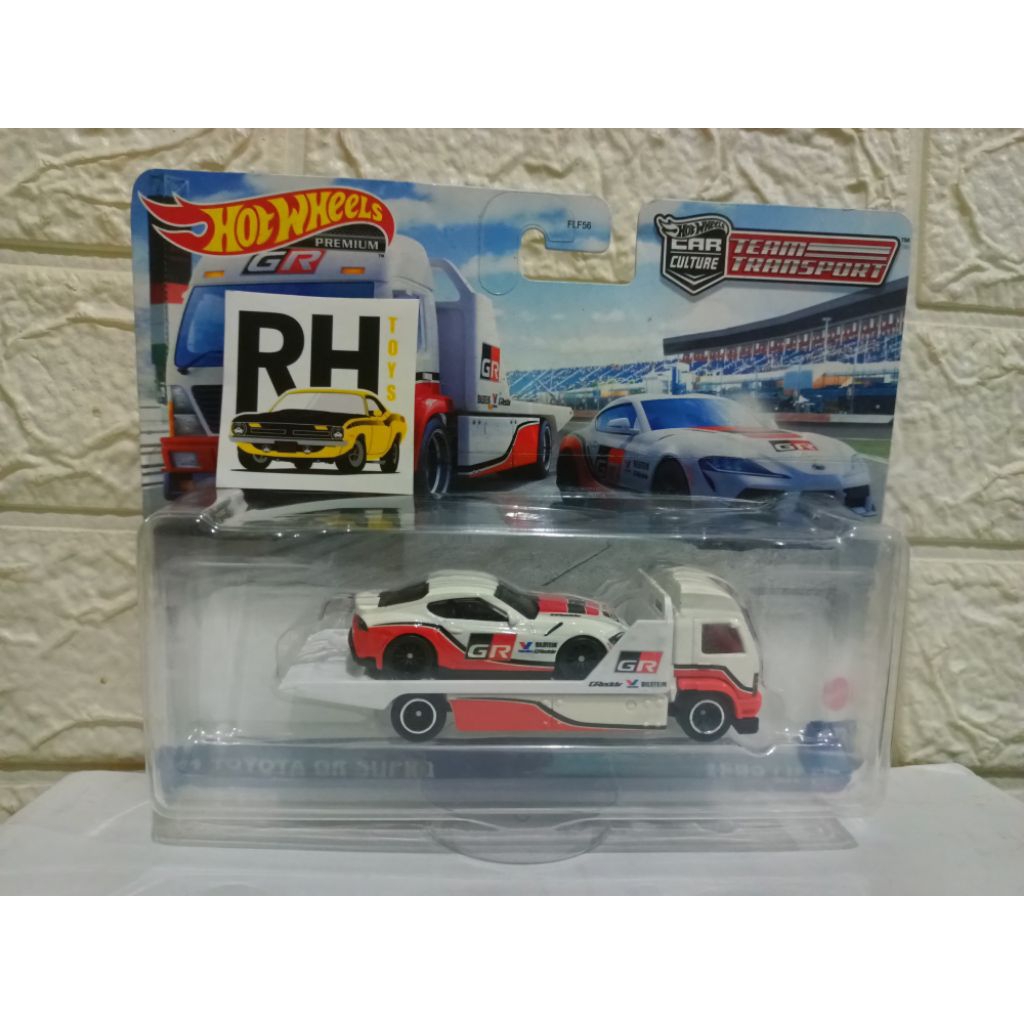 Hot Wheels 21 Toyota GR Supra Aero Lift Team Transport Premium ban karet