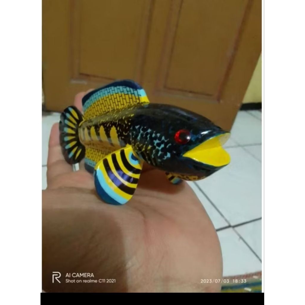 Patung Channa Auranti