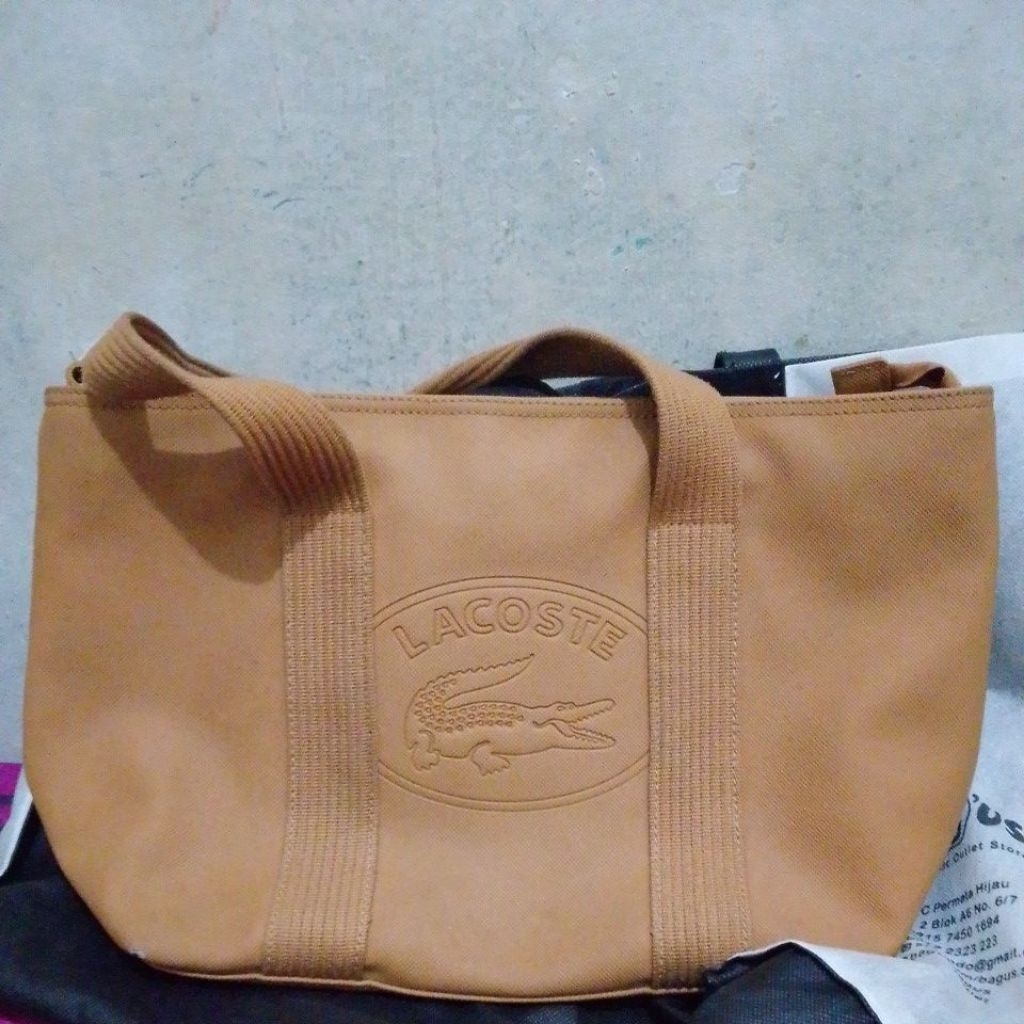 tas lacoste