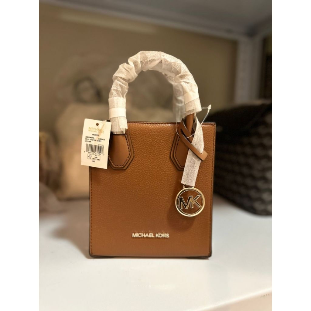 mk mercer xs brown