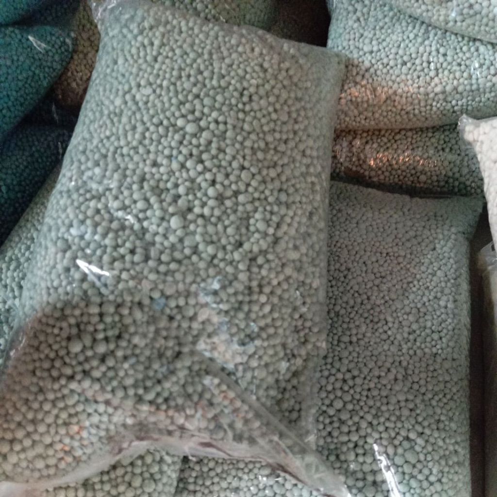 pupuk NPK GROWER MUTIARA 15-09-20+TE, kemasan repacking 1 kg warna hijau untuk tanaman di fase bunga
