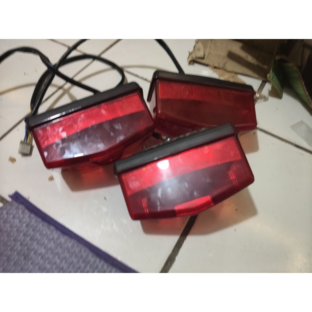 LAMPU BELAKANG RX KING ORIGINAL PERERDAM 2008