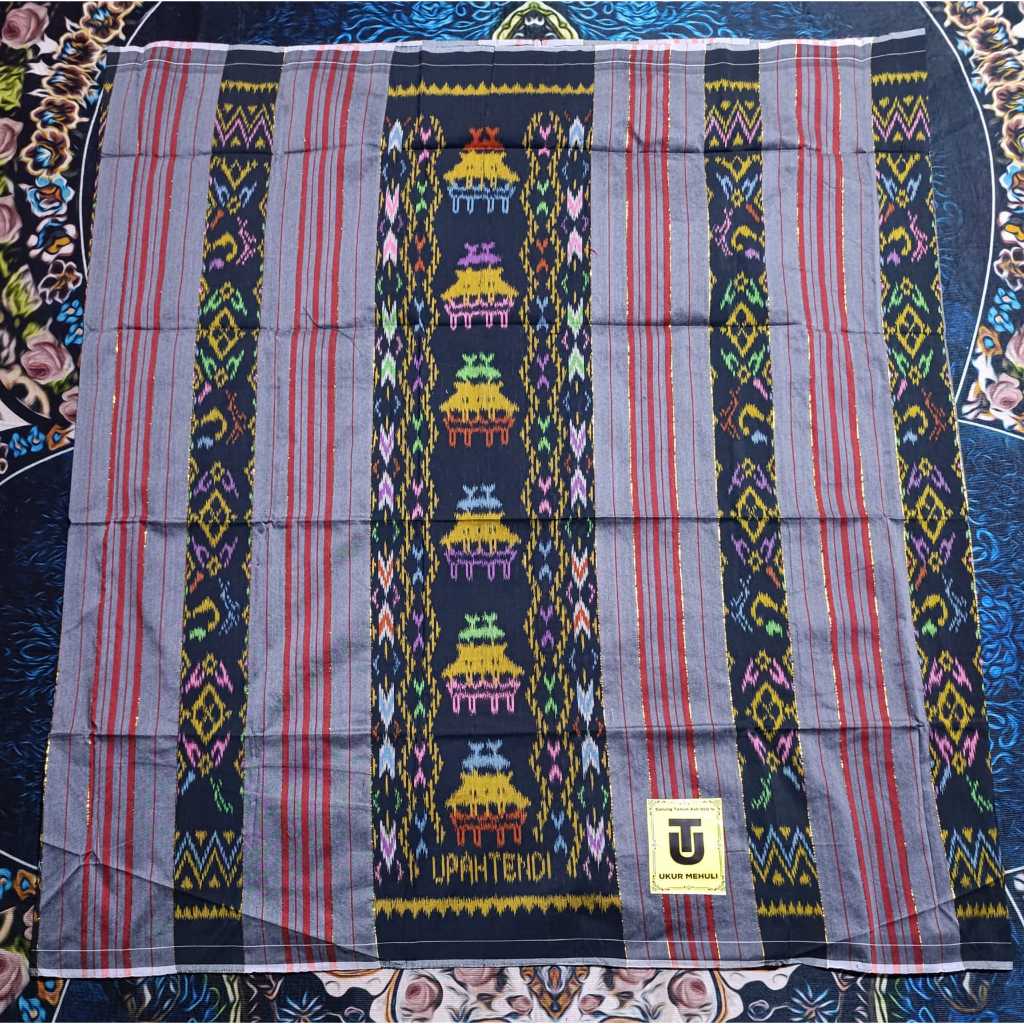 Sarung Upah Tendi Rumah Adat