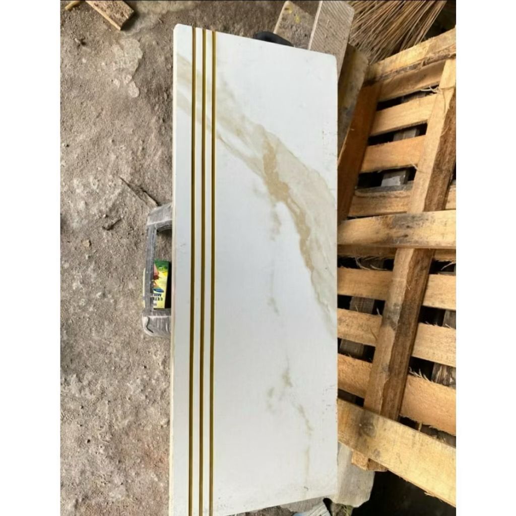 GRANIT TANGGA MOTIF MARMER PUTIH EMAS STATUARIO GOLD 30X60,30X80,30X90,30X100,30X120