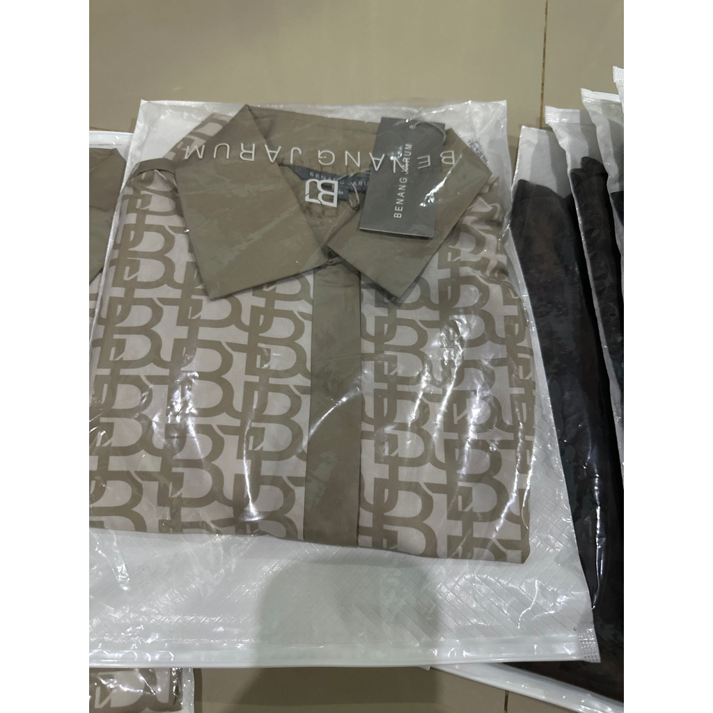 monogram polo shirt by benang jarum