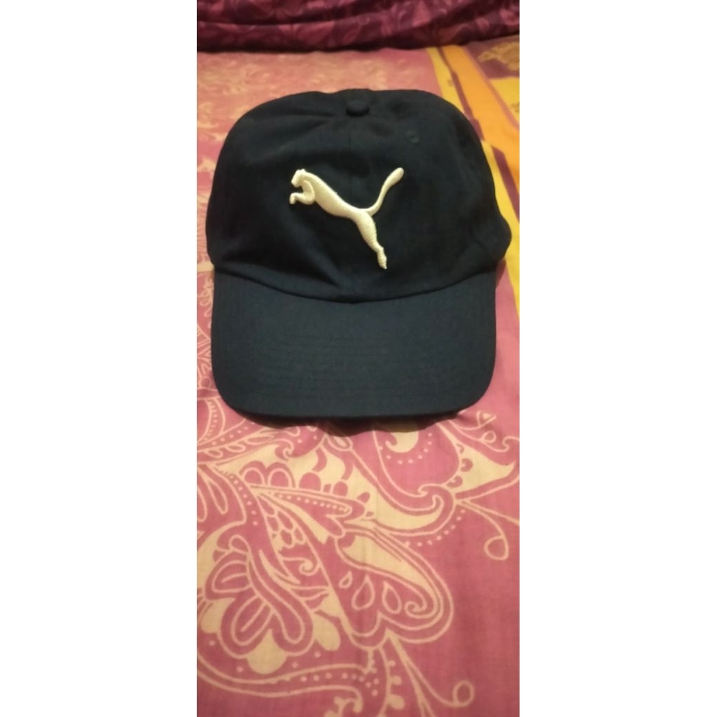 Topi puma essentials
