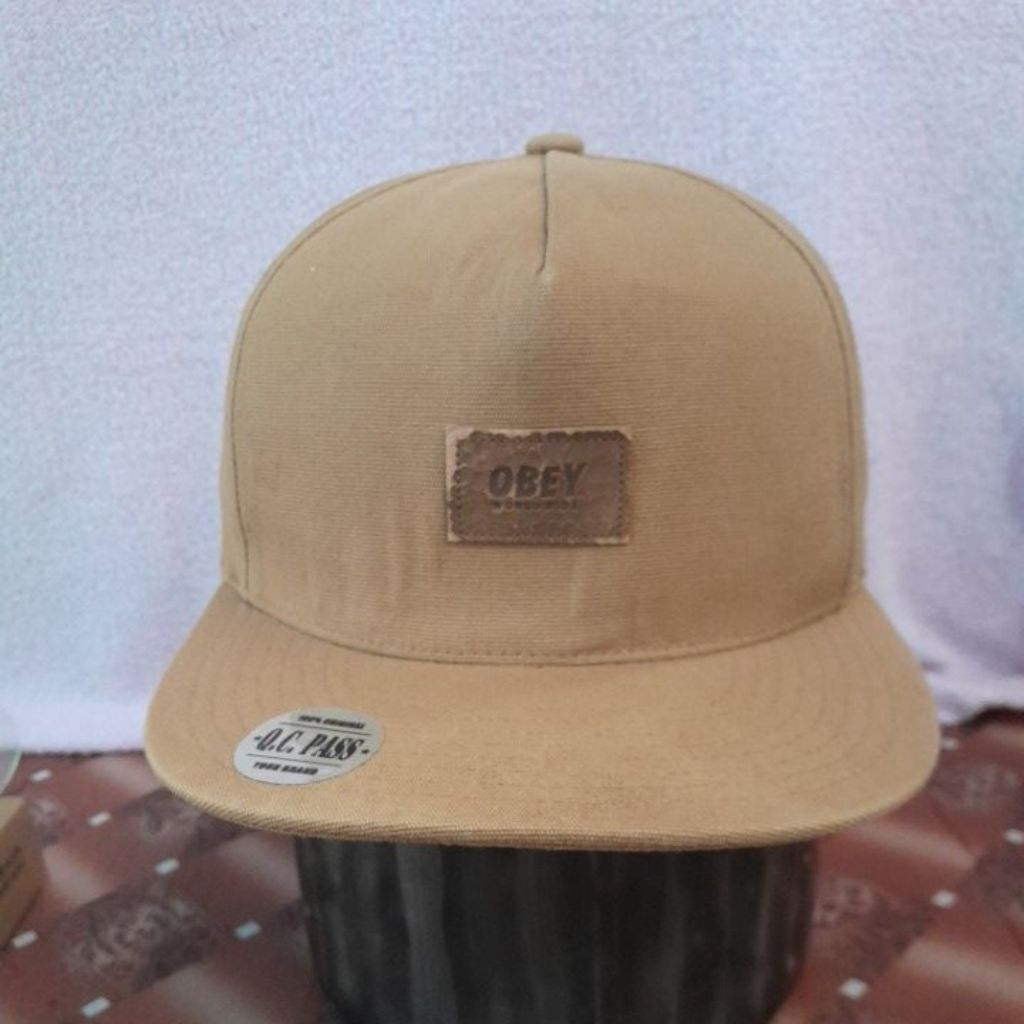 topi brand second ( OBEY )