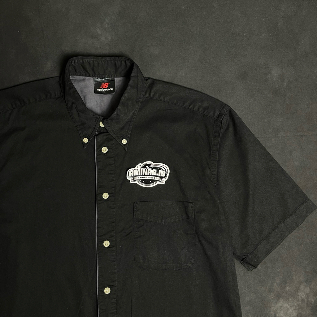 Kemeja New Balance Hitam (SCND)