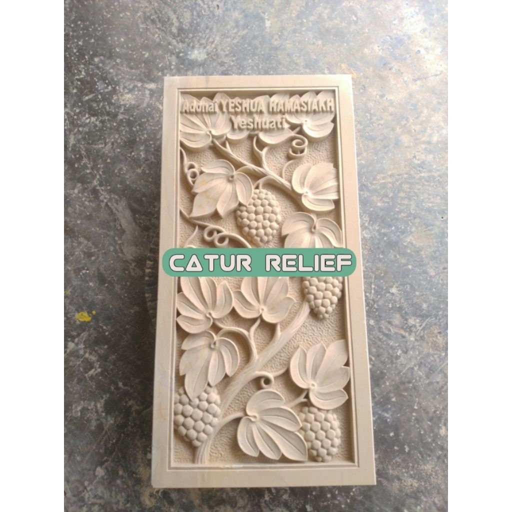Relief ornamen loster ukiran batu alam motif anggur