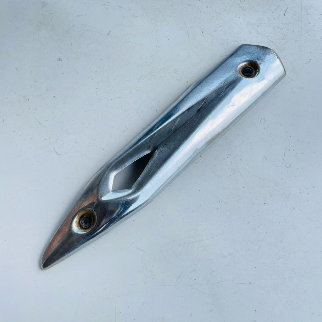 TAMENG TUTUP KNALPOT SHOGUN 125 FL ORIGINAL COPOTAN
