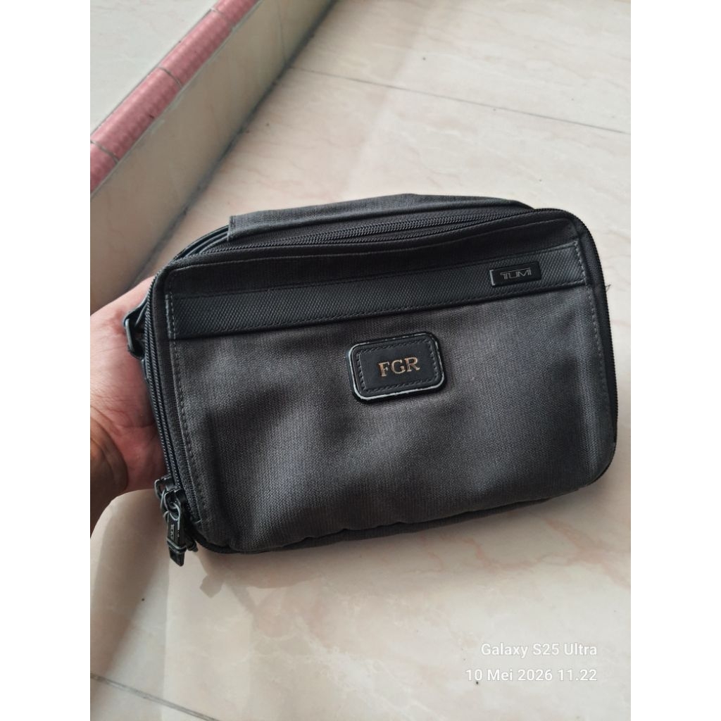 tumi clutch dan tas