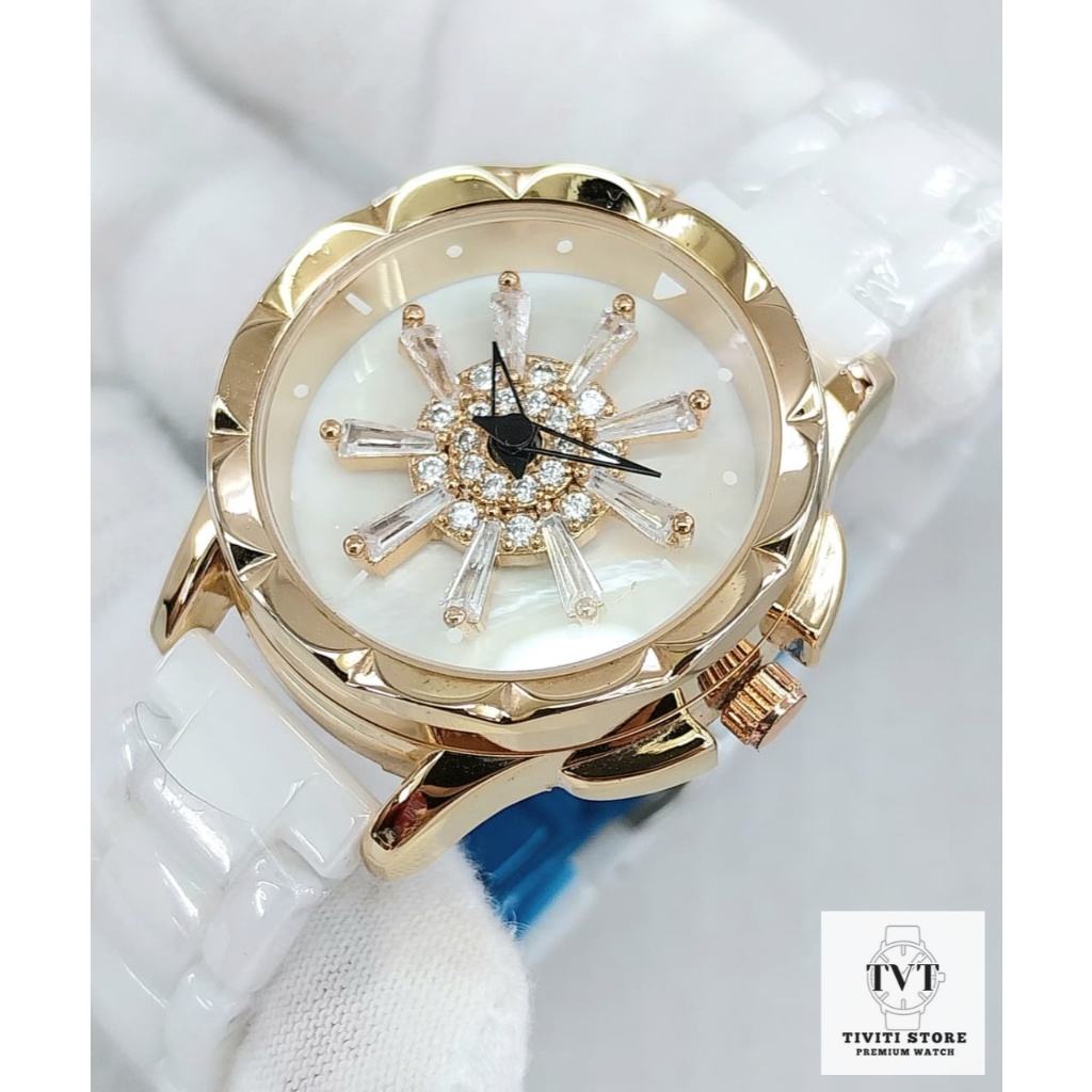Jam Tangan Wanita Case Bulat Dial Putih Hiasan Kristal Strap Keramik Putih Aksen Gold
