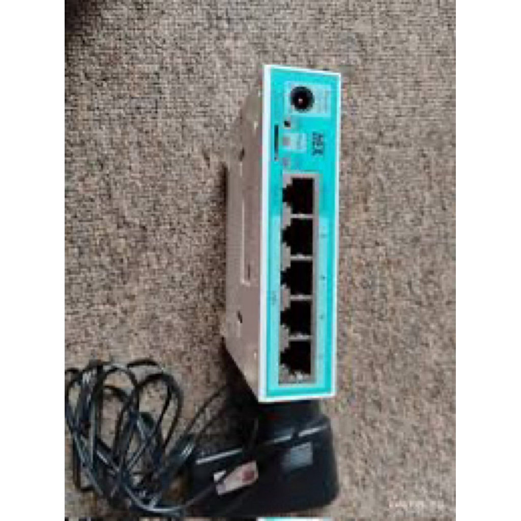 Mikrotik rb750gr3 bekas Normal + Adaptor