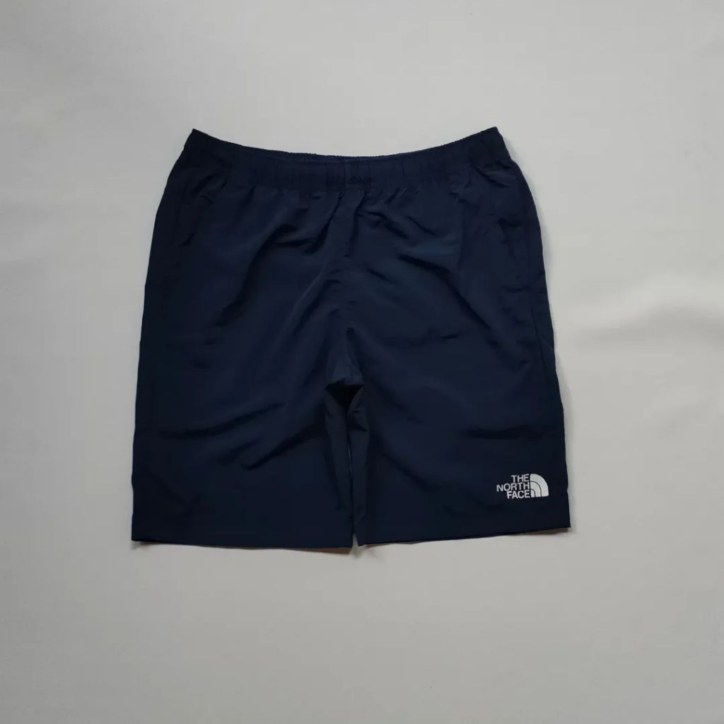 Celana pendek TNF