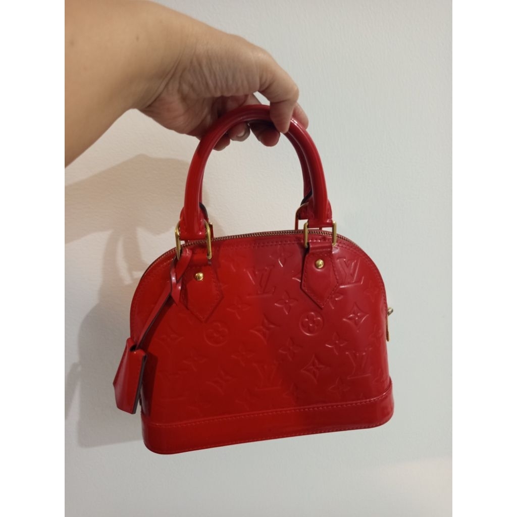 lv alma bb red vernish