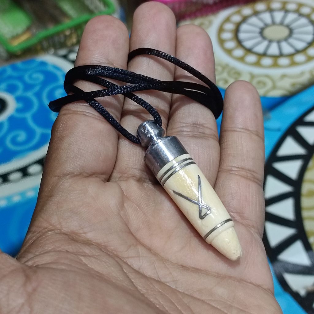 kalung pria tanduk pupul karya nini imay
