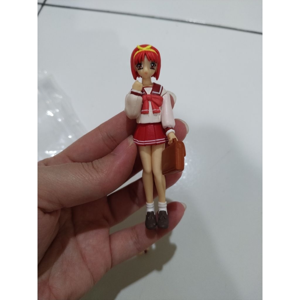 mainan anak figur Akari Kamigishi dari seri "SR ToHeart Real Figure Collection" buatan Yujin.