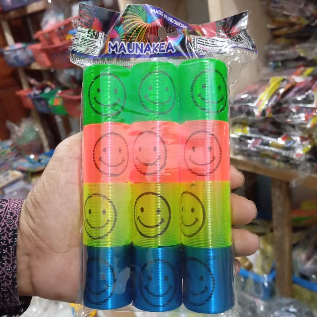 Mainan Per Spiral Pelangi Slinky Smile Isi 12 Pcs Pak / Rainbow Spring Karakter Senyum Maunakea / Ma