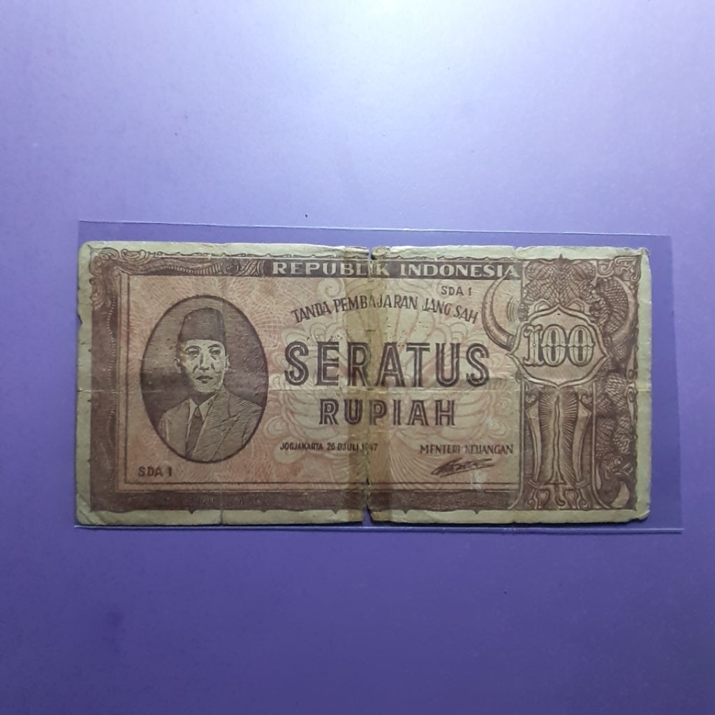 uang kuno 100 rupiah coklat 1947