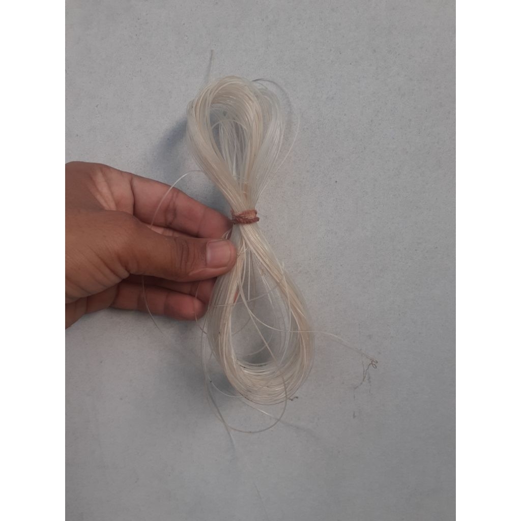 Benang pancing laut original warna bening bekas