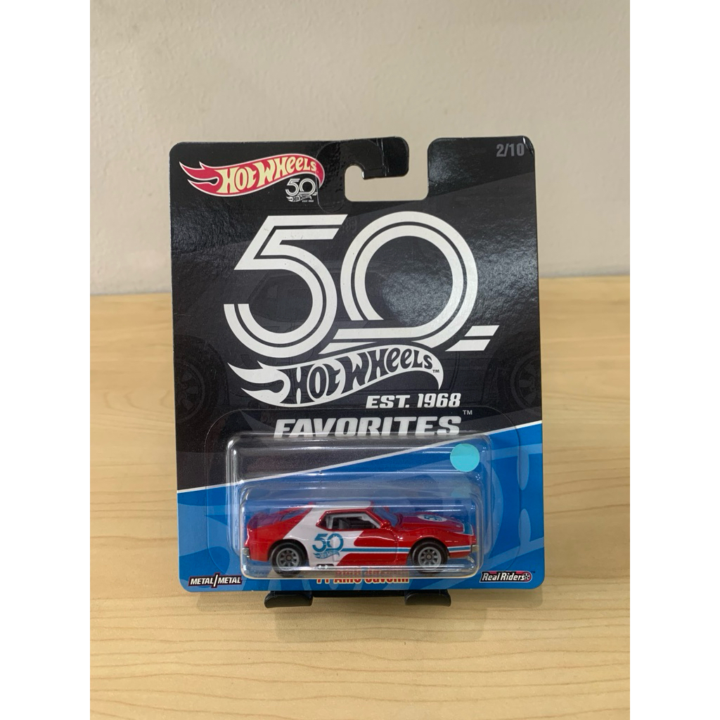 hot wheels 71 amc javelin merah