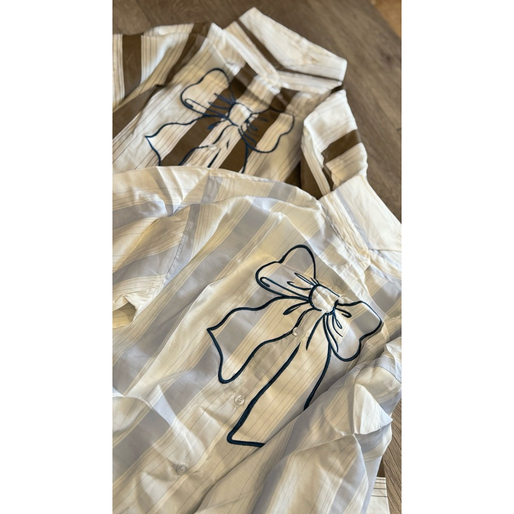 Kemeja pita ninety nine