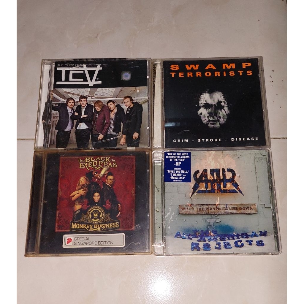 cd THE CLICK FIVE-TCV (1) / SWAMP TERRORISTS-Grim Stroke Disease / THE BLACK EYED PEAS-Monkey Busine